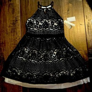 This beautifully crafted Sequin Hearts dress is great for any special occasion.